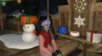Dalii sitting on a bench surrounded by Starlight decorations, wearing a red winter sweater and smiling at the camera